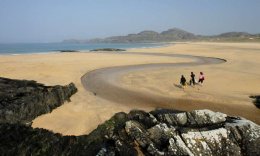 kiddies bodyboarding at Kiloran Bay,  Isle of Colonsay